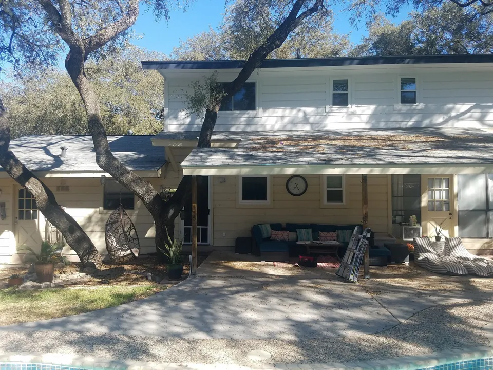 Home exterior and pool before the addition